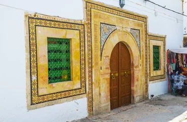 Fotobehang The tiled facade of medieval edifice, Sfax, Tunisia © efesenko