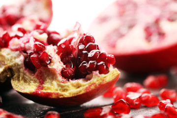 Ripe and juicy pomegranate. Red organic pomegranate.