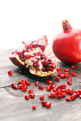 Ripe and juicy pomegranate. Red organic pomegranate.