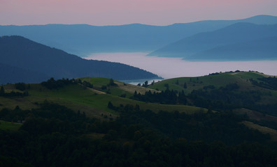 Fototapeta na wymiar Fog in autumn, the mountains of the Carpathians in Ukraine