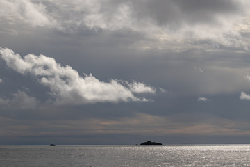 sea and dramatic blue sky