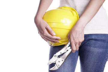 Women holding helmet and wrench in hand. Craftsman tool