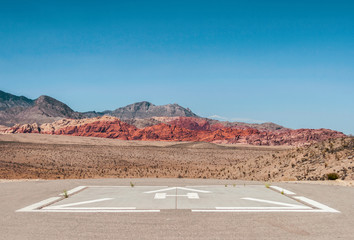 Helicopter landing pad in Red Rock Canyon, Nevada, on a sunny day of summer, USA. © Matthieu