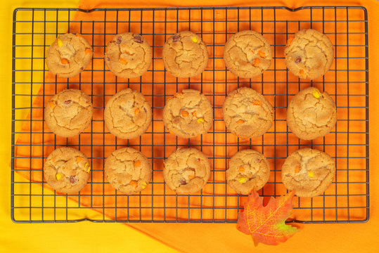 Autumn Fall Cookies On A Baking Cooling Rack Shot From Above On An Orange Placemat