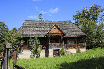 Fototapeta na wymiar Sighetu Marmatiei, Romania. Old vilage in Maramures, Romanian traditional architectural style. Romania