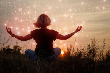 Woman engaged in meditation on the background of the network .