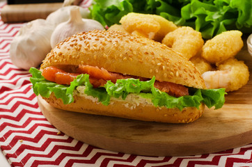 Open sandwich with cream cheese, salmon and salad