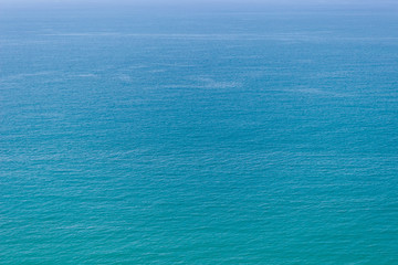 sea turquoise water surface, top view.