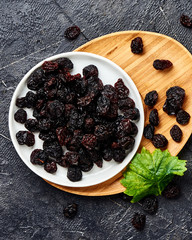 Dried cherry on plate. Top view of berries.