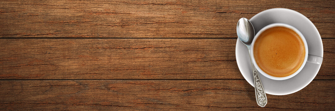 cup of espresso / coffee on wooden board
