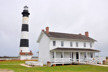 Bodie Island Lighthouse and keeper`s quarters in Cape Hatteras National Seashore, south of Nags...