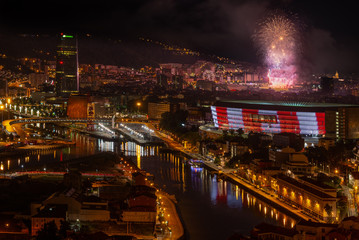 Fototapeta na wymiar Bilbao at night with the fireworks during the festival of Aste Nagusia, Basque Country, Spain