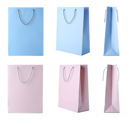 Set with shopping bags on white background