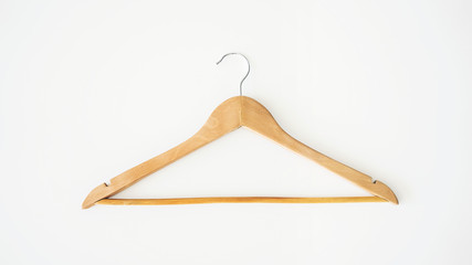 Empty wooden hangers for clothes