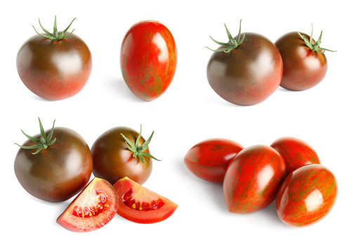 Set with delicious ripe tomatoes on white background