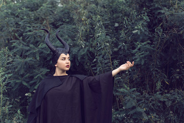 A young girl in a fairy tale suit
