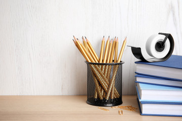 Obraz premium Different stationery on wooden table. Back to school