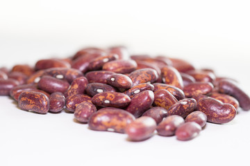 Red kidney beans isolated on white background. Background of red beans. Healthy eating concept. Close up Red beans background, Red beans seeds.