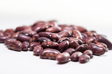 Red kidney beans isolated on white background. Background of red beans. Healthy eating concept. Close up Red beans background, Red beans seeds.