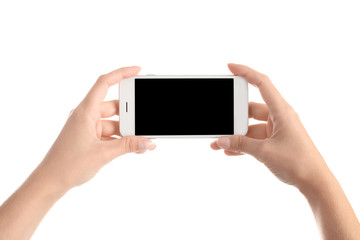 Woman holding smartphone with blank screen on white background. Mockup for design