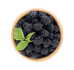 Bowl with ripe blackberries on white background, top view