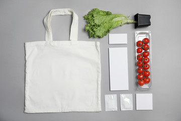 Flat lay composition with items for mock up design on gray background. Food delivery service