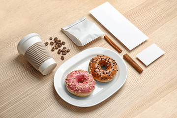 Composition with items for mock up design on wooden background. Food delivery service