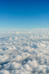 Deep blue and fluffy clouds sky
