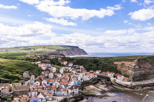 A view of the North Yorkshire UK villages of Staithes and Cowbar, seen here from from Penny Nab headland.