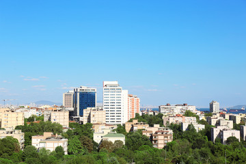 Picturesque view of city with beautiful buildings near sea