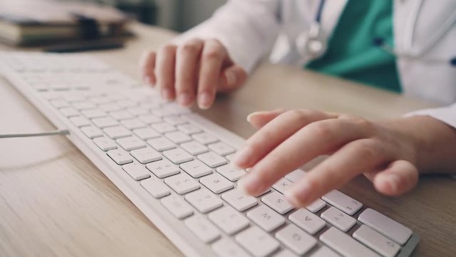Female health worker using computer