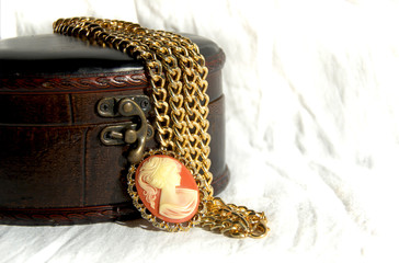 decor, women's jewelry gold chain, cameo brooch with leather gift box.