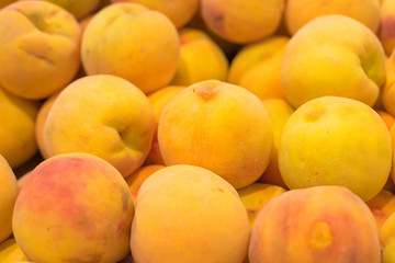 Fresh peaches background shallow deep of field.