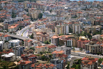  Panorama of the city. Numerous houses of the coastal city. The view from the height of bird flight.