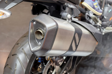 Exhaust pipe sport motorcycle. Closeup view, back view