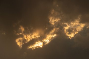 sunbeam behind clouds
