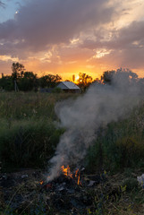 fire, burn a bunch of dry grass