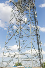 Communications tower with blue Cloud sky background