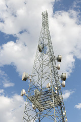 Communications tower with blue Cloud sky background