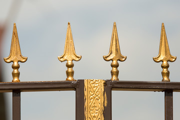 Fragment of the fence of sharp wrought iron