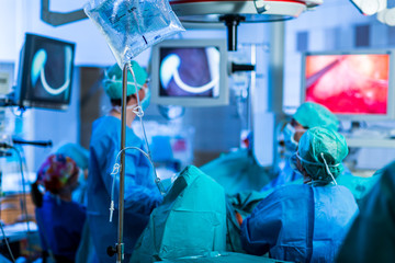 Unidentified patient undergoing a surgery (no faces, shallow DOF)