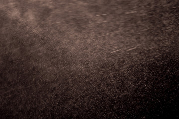 abstract water splashes on a brown background