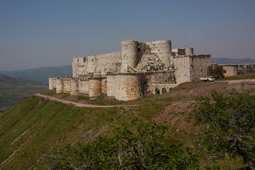 Krak des Chevaliers - The biggest and popular cruzades castle in middle east in Syria - obrazy, fototapety, plakaty