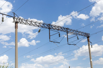 Train or railway power line support. Railway power lines with high voltage electricity on metal...