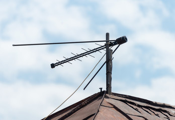 TV antenna aerial on the roof of the sky and