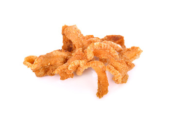 pile of fried pork rinds on white background