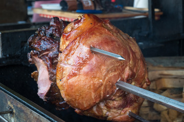 the pig's leg on the grill, roast, Prague
