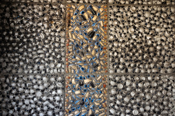 texture of broken dishes on the wall