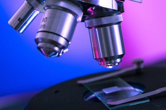 Closeup of Microscope Lenses and Slide