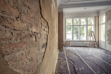 renovation concept  - plastering wall in old apartment room  restoration